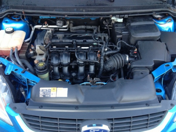 На фото: двигатель 1.6 Ti (HXDA; HXDB; SIDA) 115 л.с. Ford Focus